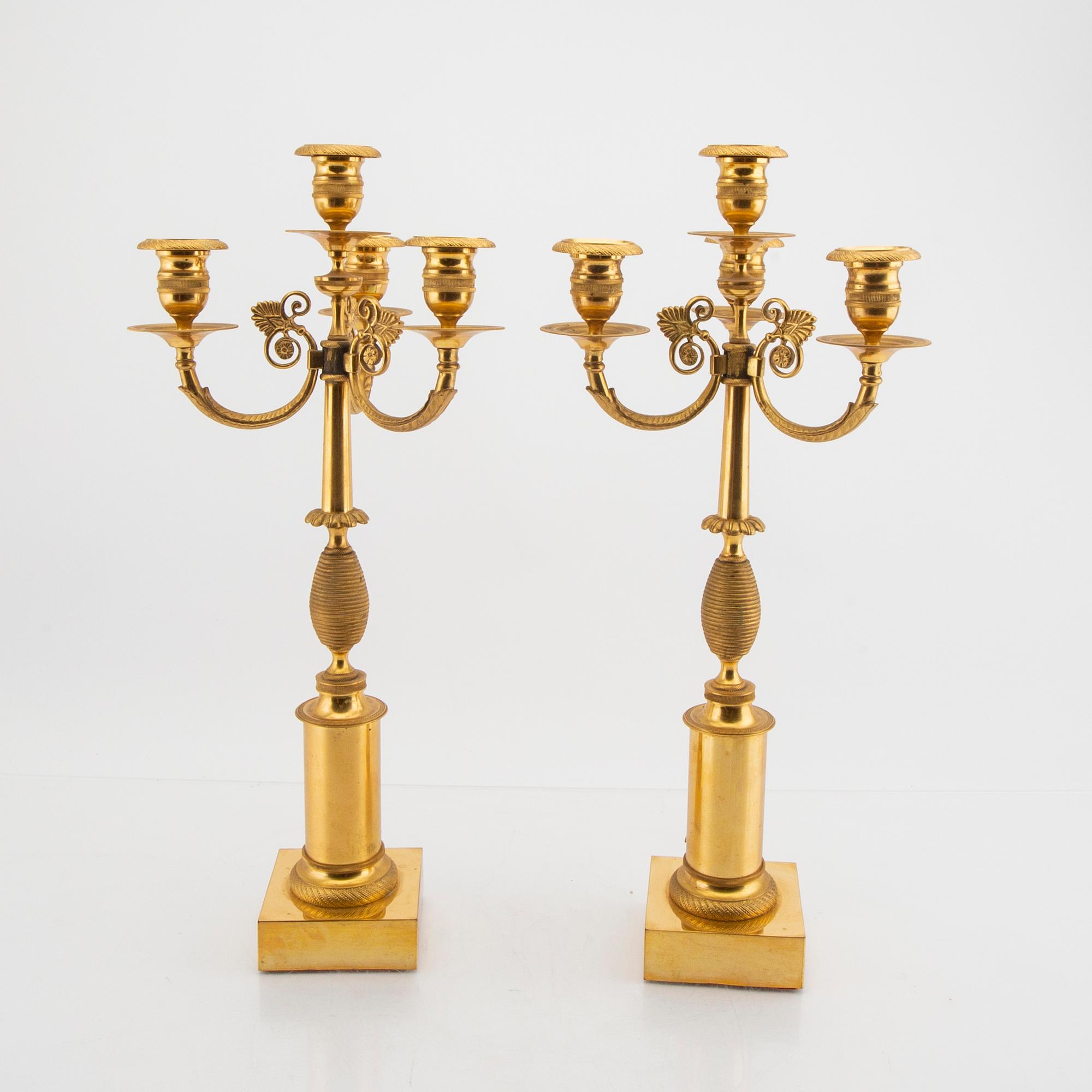 A pair of Empire style candelabras first half of the 20tyh century.