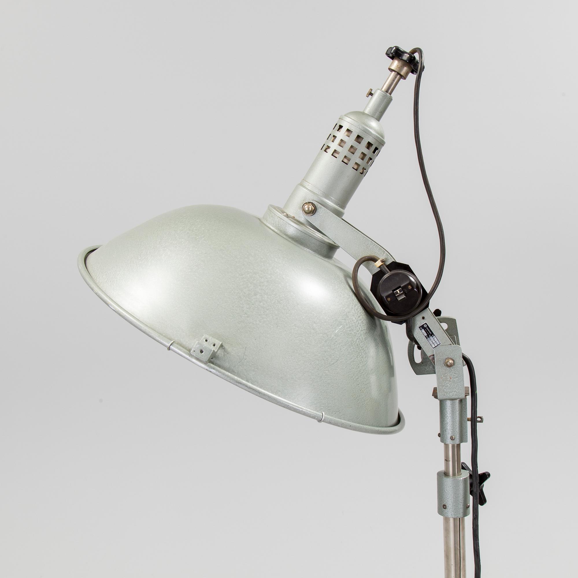 A German metal floor light from the mid 20th century.