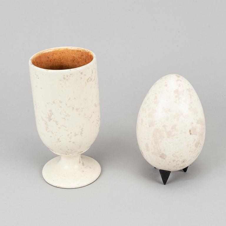 Hans Hedberg, a faience sculpture of an egg and a vase / egg cup, Biot, France.