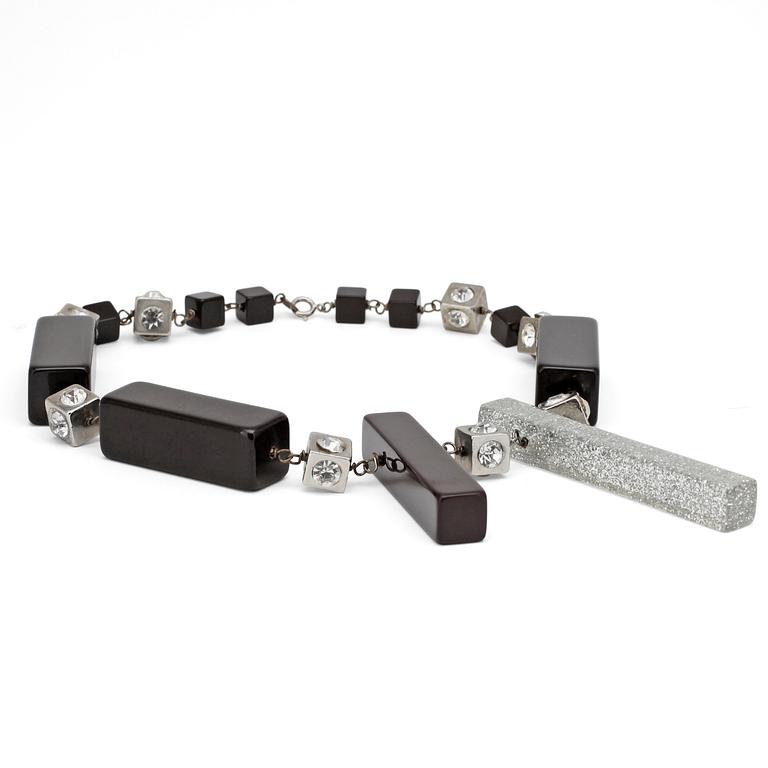 NINA RICCI, a necklace.