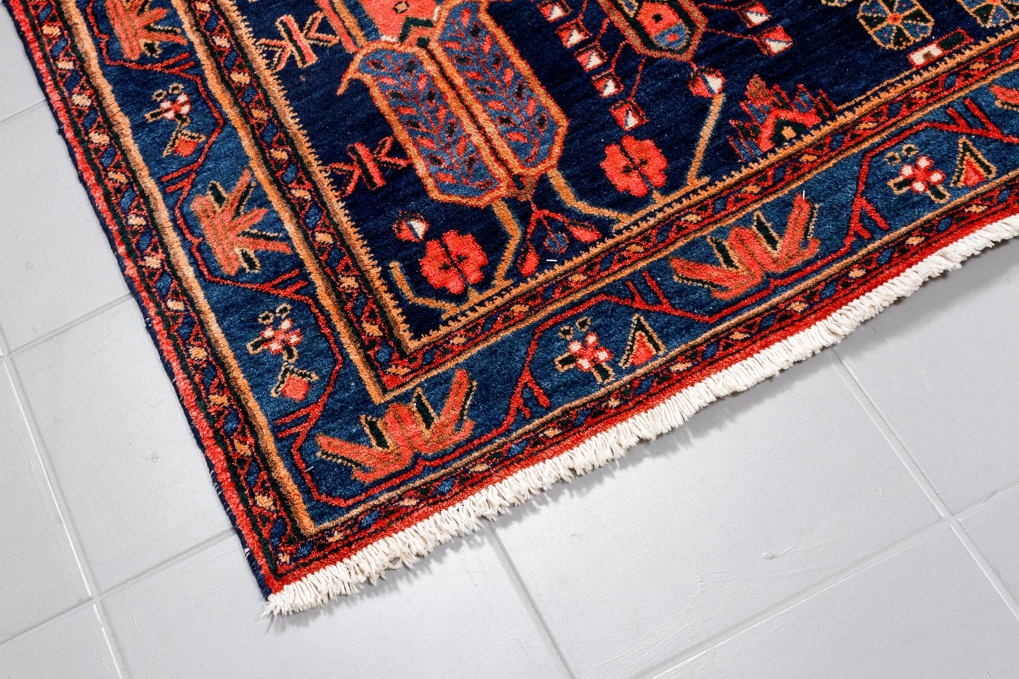 A north west persian rug, 218 x 159 cm.