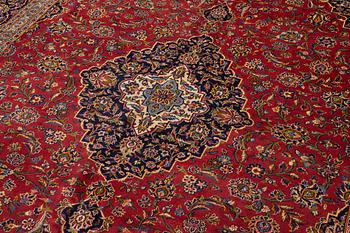 A Keshan carpet, central Iran, signed c, 392 x 301 cm.