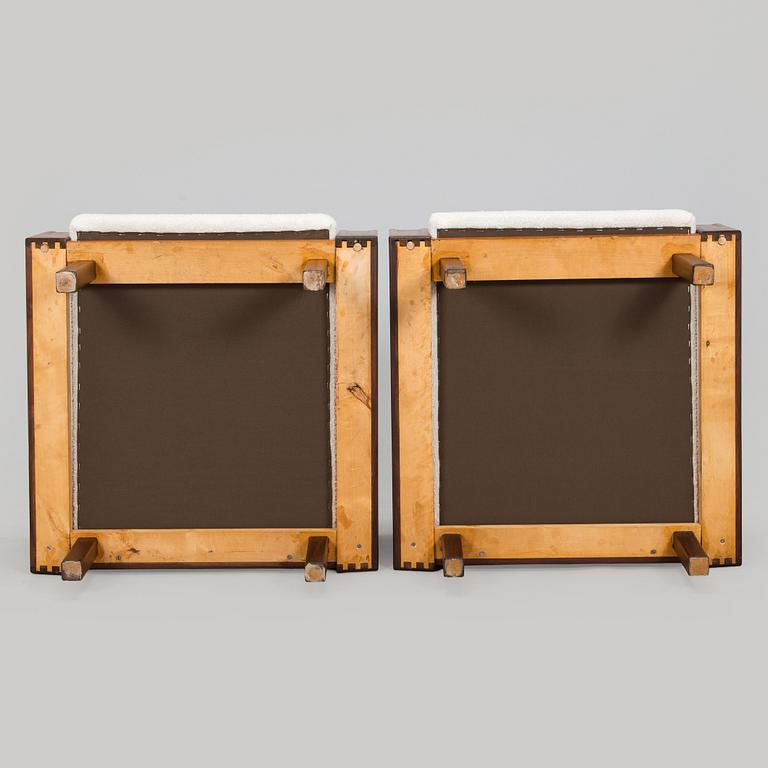 A pair of 1960s armchairs.