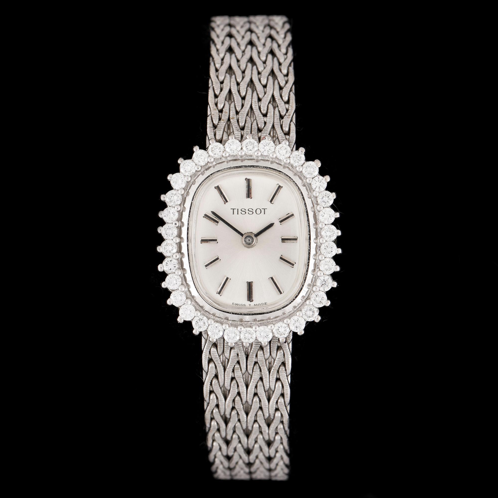 ARMBANDSUR, dam, Tissot, manuell, 18k vitguld, krans med briljantslipade diamanter tot ca0,68ct. Vikt 34g.