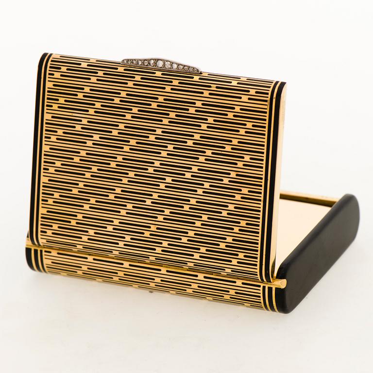 A CARTIER VANITY CASE, 18K gold, enamel, rose cut diamonds. 1930s.