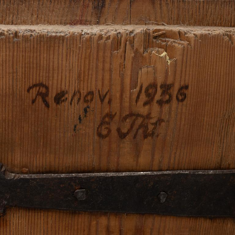A corner cabinet, 18th Century.
