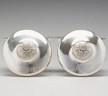 A pair of Swedish Empire silver tureens on stand, mark of Adolf Zethelius, Stockholm 1830.
