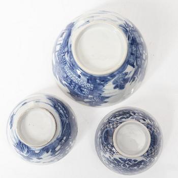 A Chinese blue and white jug, an ewer and three cups, Qing dynasty, Qianlong (1736-95).