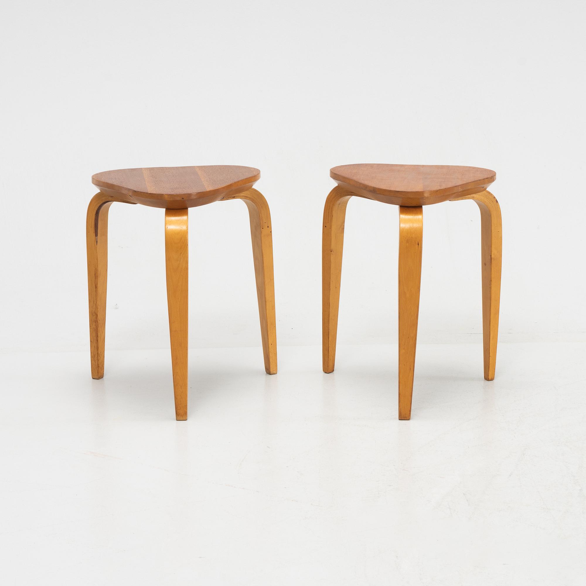 Gustav Axel Berg, a pair of Swedish Modern stools, mid 20th century.