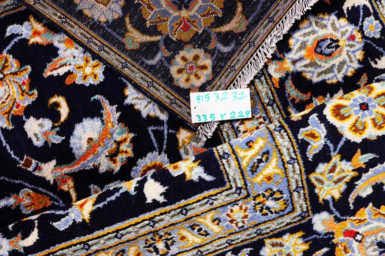 A Kashan carpet, c. 335 x 224 cm.