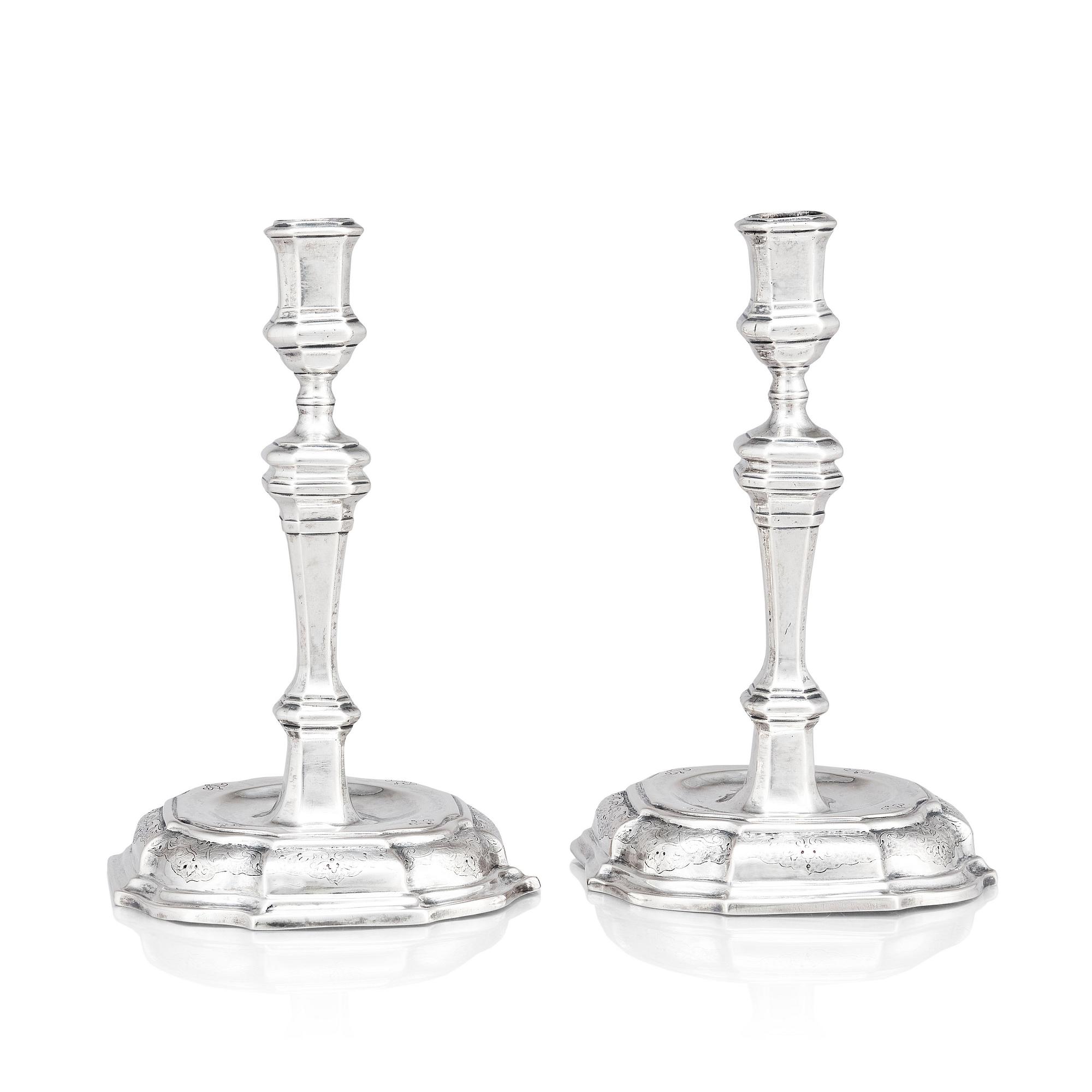 A pair of Swedish early 18th century silver candlesticks, mark of Petter Ersson Lund, Stockholm 1727.