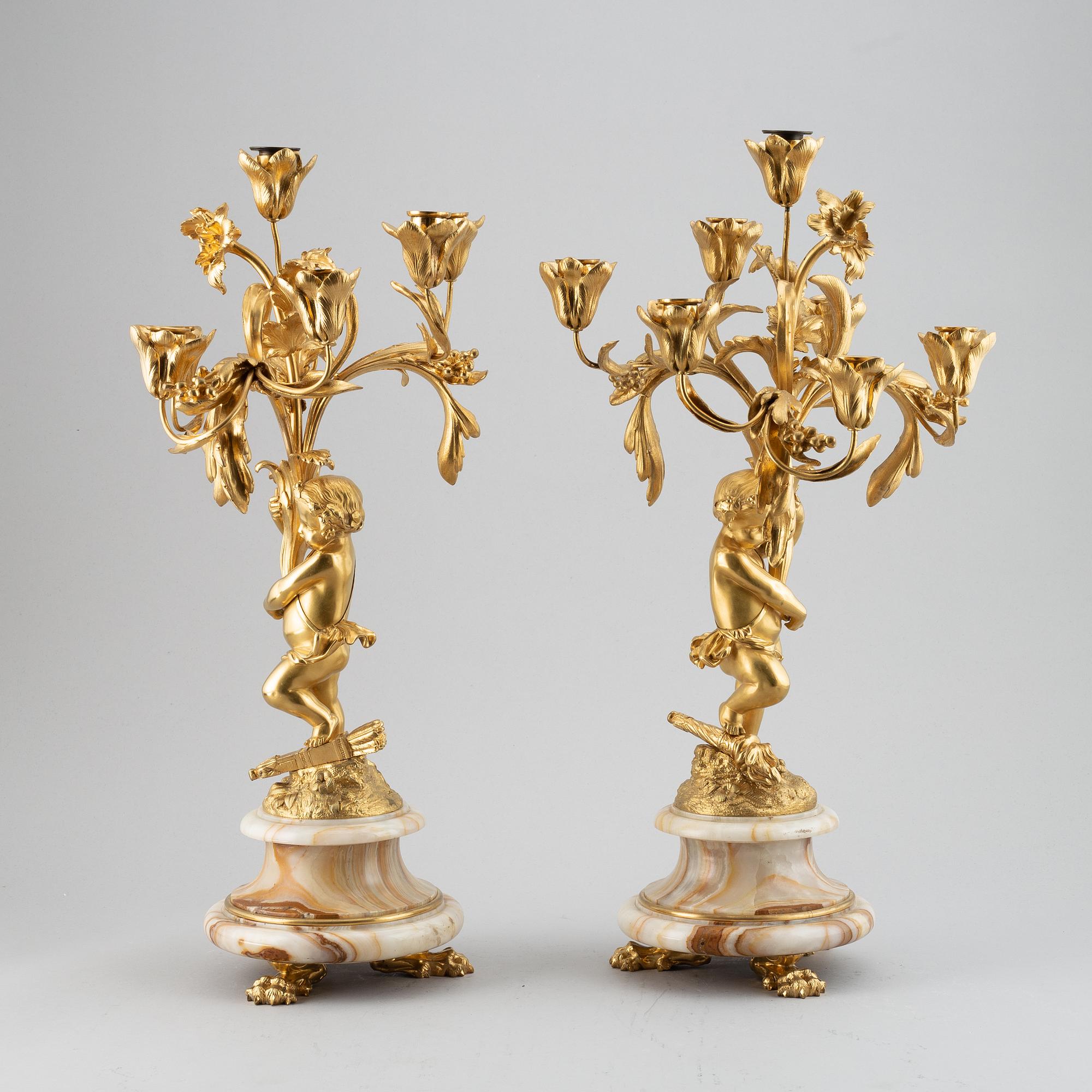 A pair of mid 19th century ormolu and onyx candelabra.