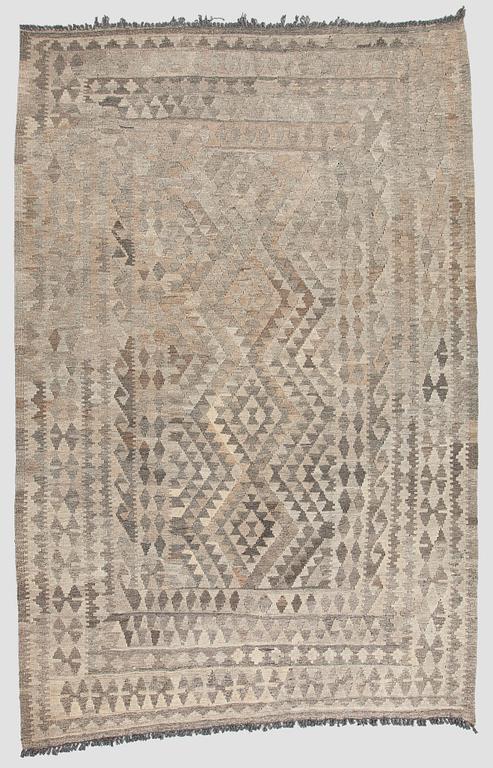 A Kilim carpet, ca. 262 x 176 cm.