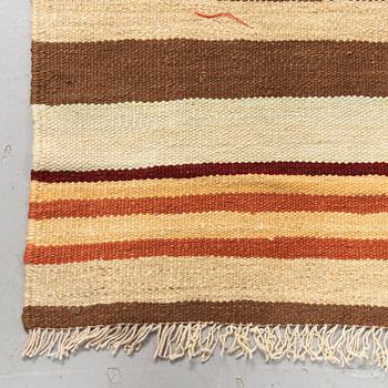 A carpet, flat weave, ca 227 x 175 cm.