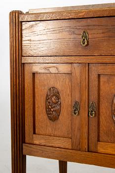 A pair of oak bedside tables beginning of the 20th century.