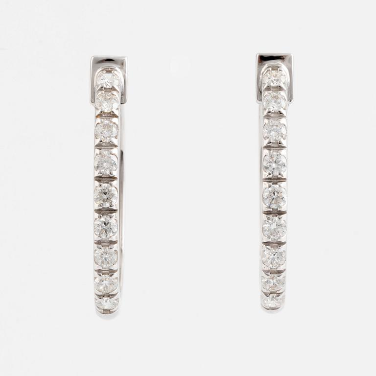 Brilliant cut diamond hoop earrings.