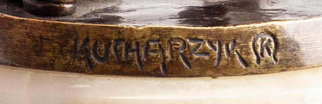 An early 20th century bronze with alabaster base by Francizek Jozef Kucharzyk.