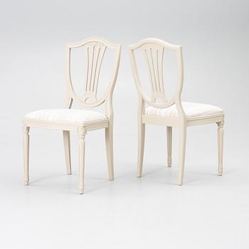 A dining table with 10 chairs, Gustavian Style dining suite, second half of the 20th century.