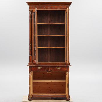 A display cabinet, late 19th century.