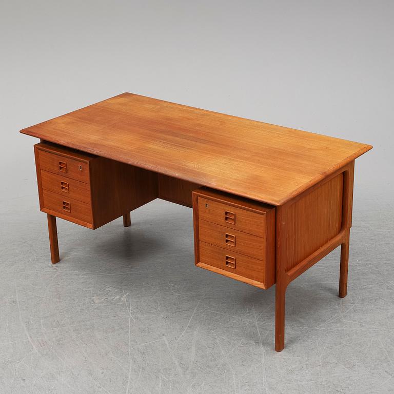 ARNE VODDER, a 1960's teak desk.