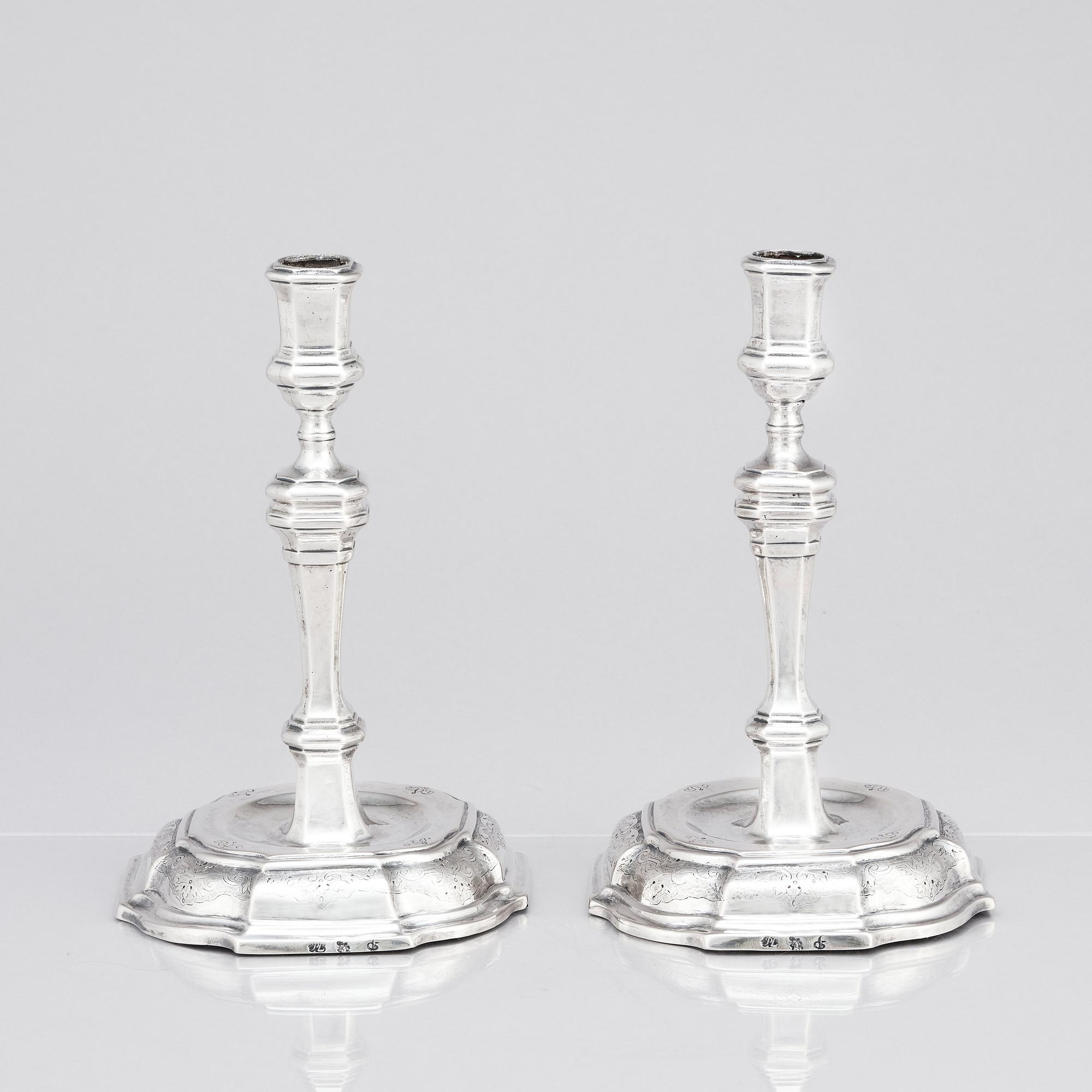 A pair of Swedish early 18th century silver candlesticks, mark of Petter Ersson Lund, Stockholm 1727.