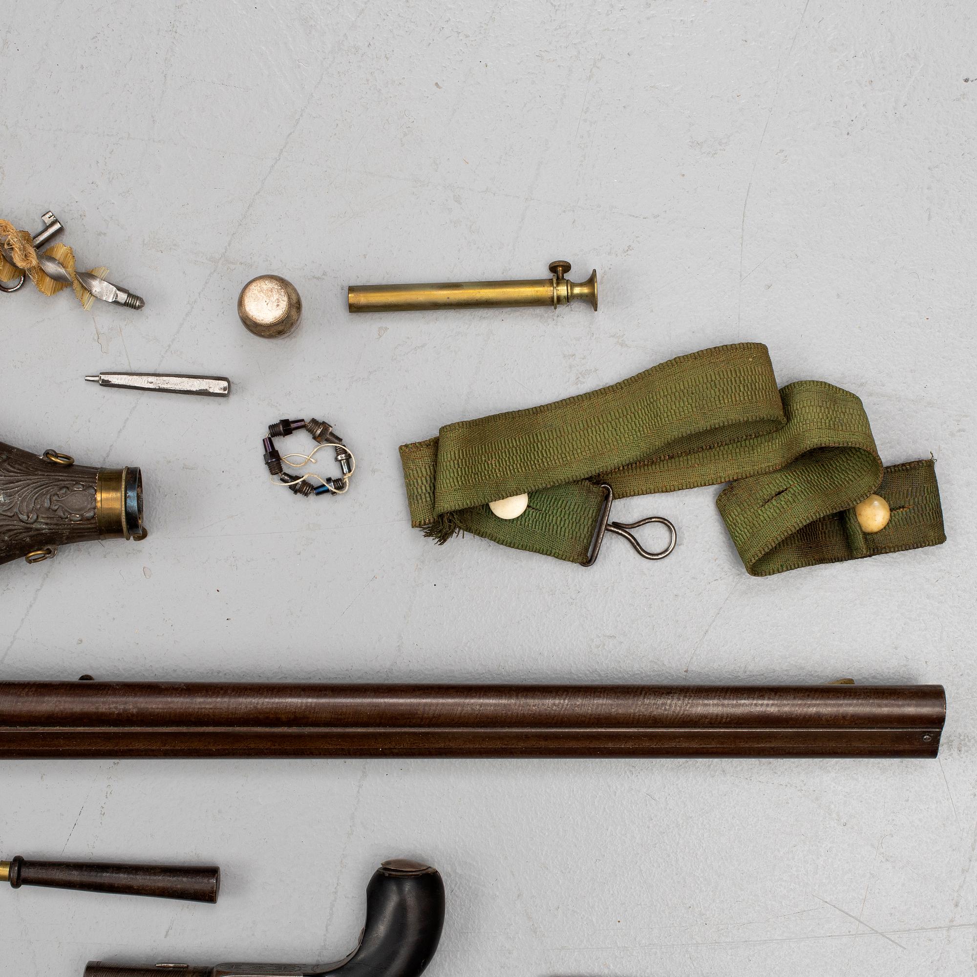A cased double barreled percussion shotgun marked Gosset a Paris and a pair of percussion pistols marked Fni PAR LEPAGE.