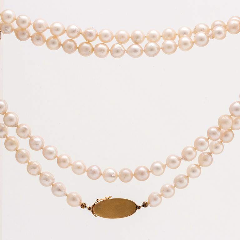 PÄRLCOLLIER odlade pärlor ca 7,5 mm lås i 18K guld , längd ca 85 cm.