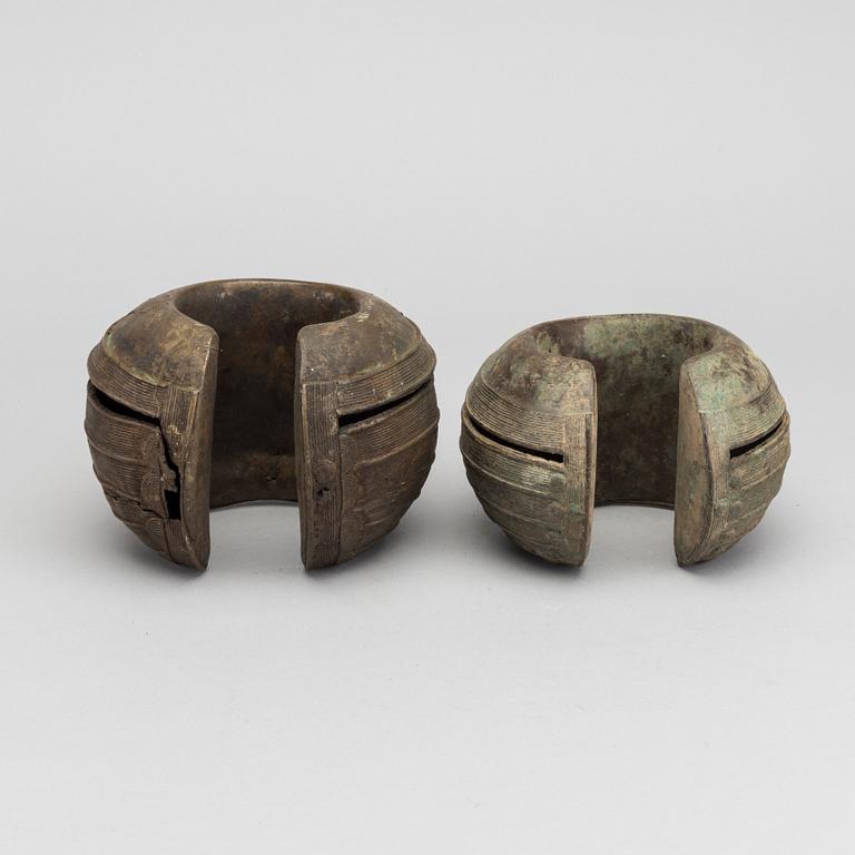 Two bronze currency braclets, Baule, Ivory Coast.