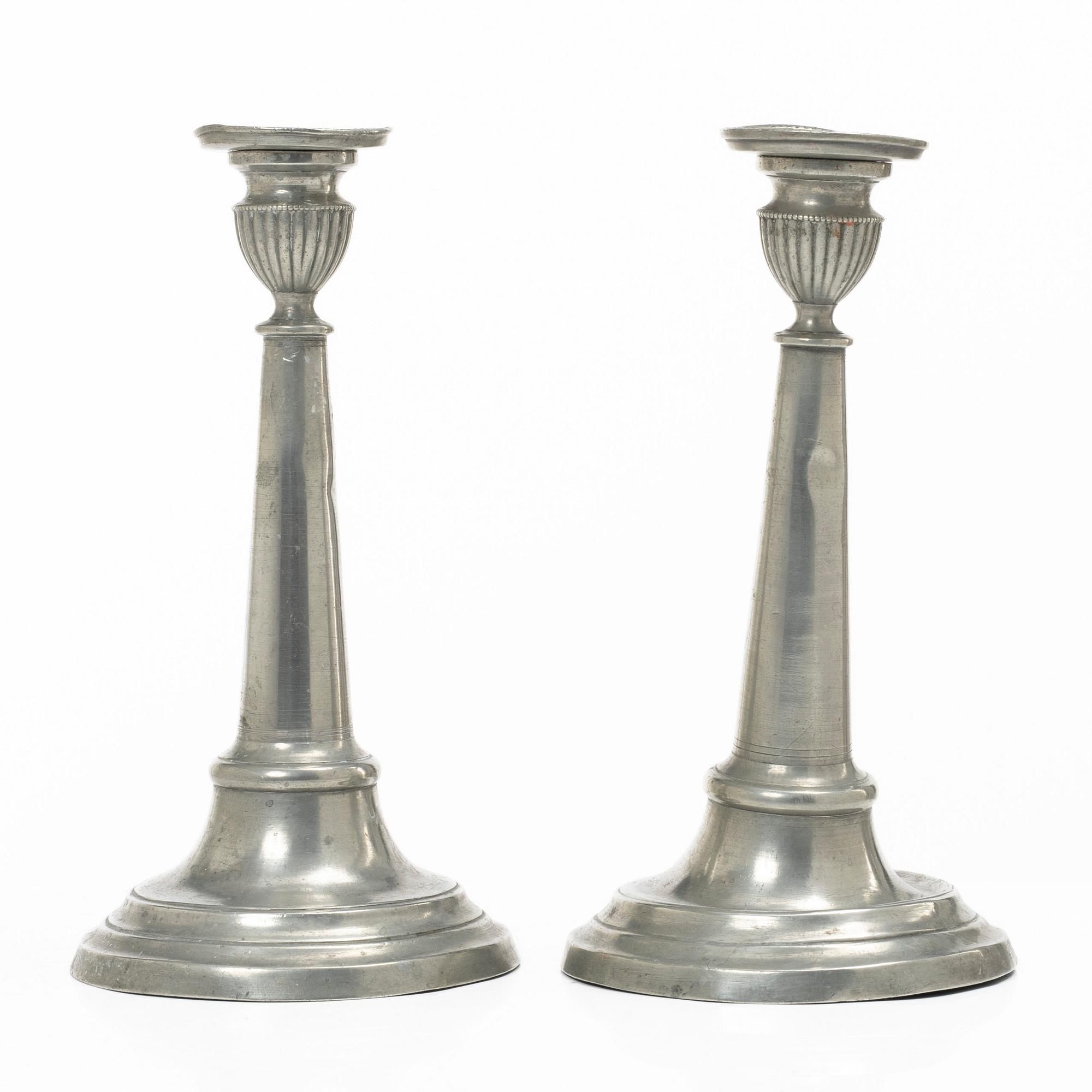 A pair of pewter candle sticks, Sweden, possibly 1844.