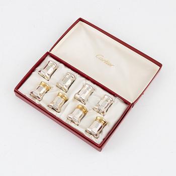 Cartier, eight sterling silver salt- and pepper shakers with case.