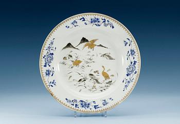 1380. A grisaille and enameled charger, Qing dynasty, Qianlong (1736-95).