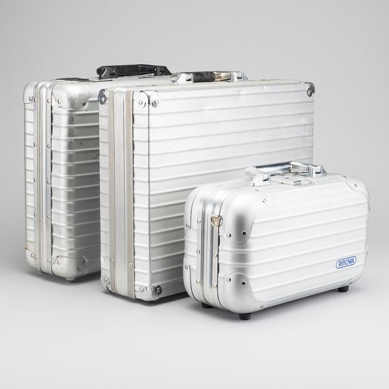 A set of three Rimowa bags later part of the 20th century.