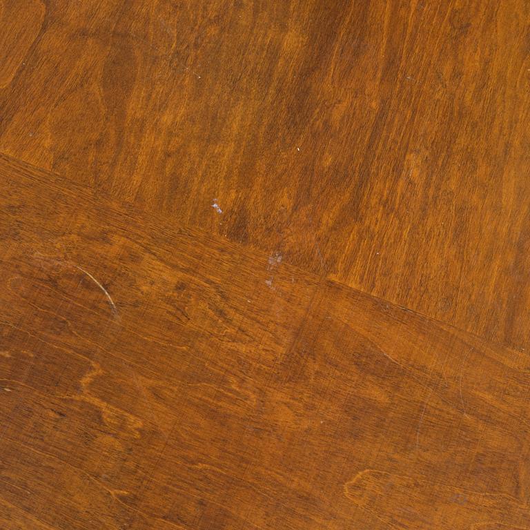 A atained birch Swedish Grace dining table, 1930's/30's.