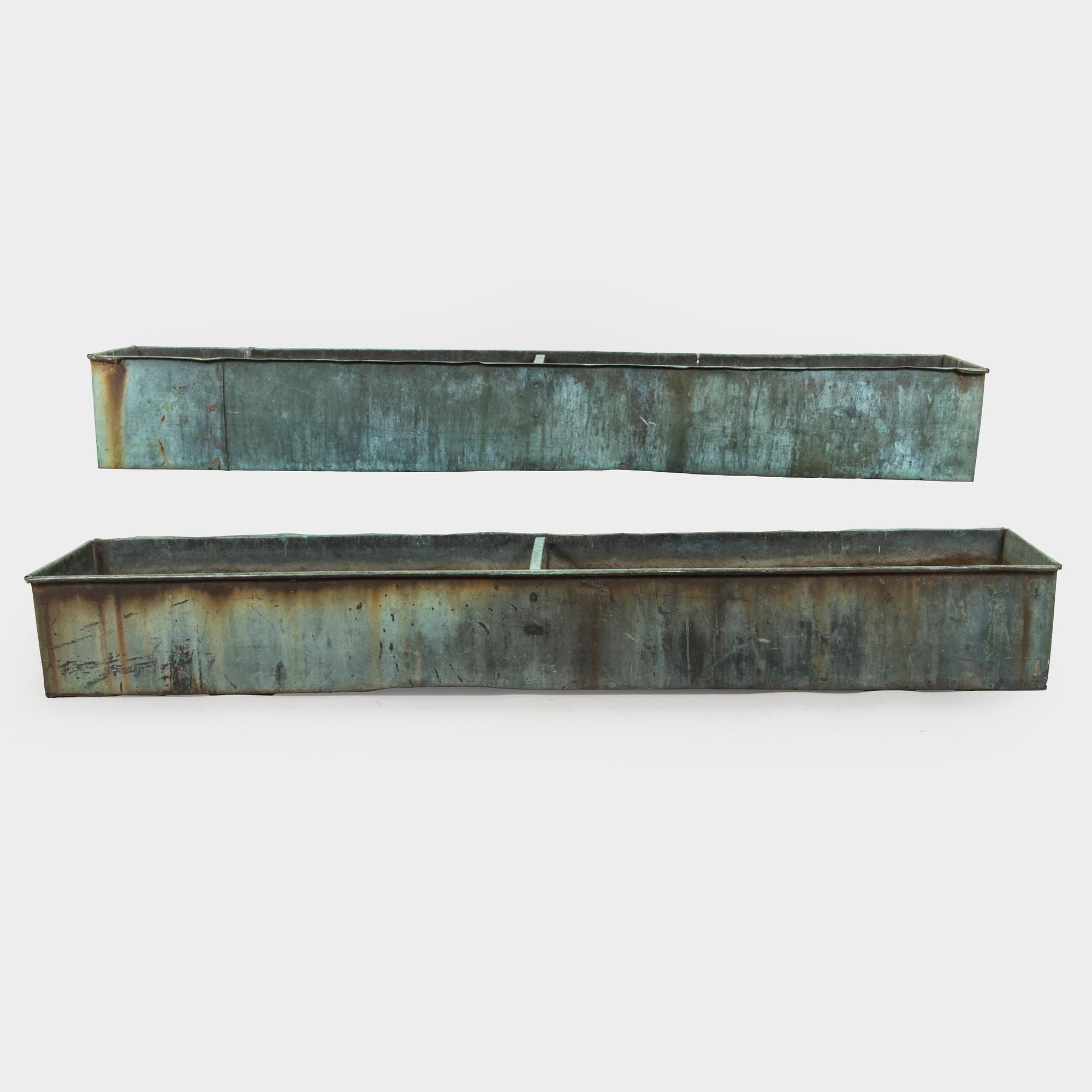 Two mid-20th century planters.
