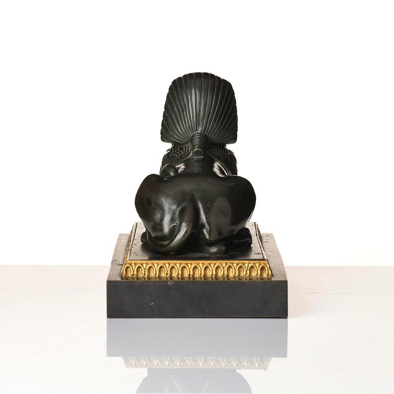 A French Empire bronze sfinx.