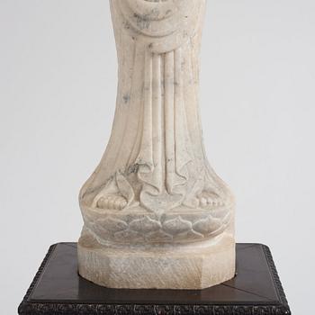 A white stone scultpure of Guanyin, China, presumably early 20th Century.