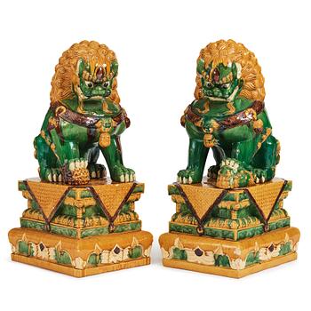 832. A pair of large buddhist lions, early 20th Century.