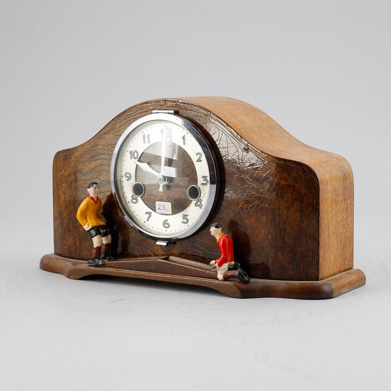 A mantle clock with mechanical footballers, first half of the 20th century.