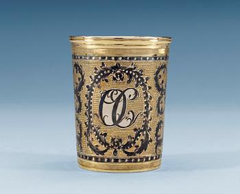 1142. A RUSSIAN SILVER-GILT AND NIELLO BEAKER, unidentified makers mark, Moscow 1826.