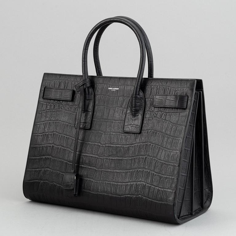 Yves Saint Laurent, a crocodile embossed 'Sac de Jour' leather handbag.
