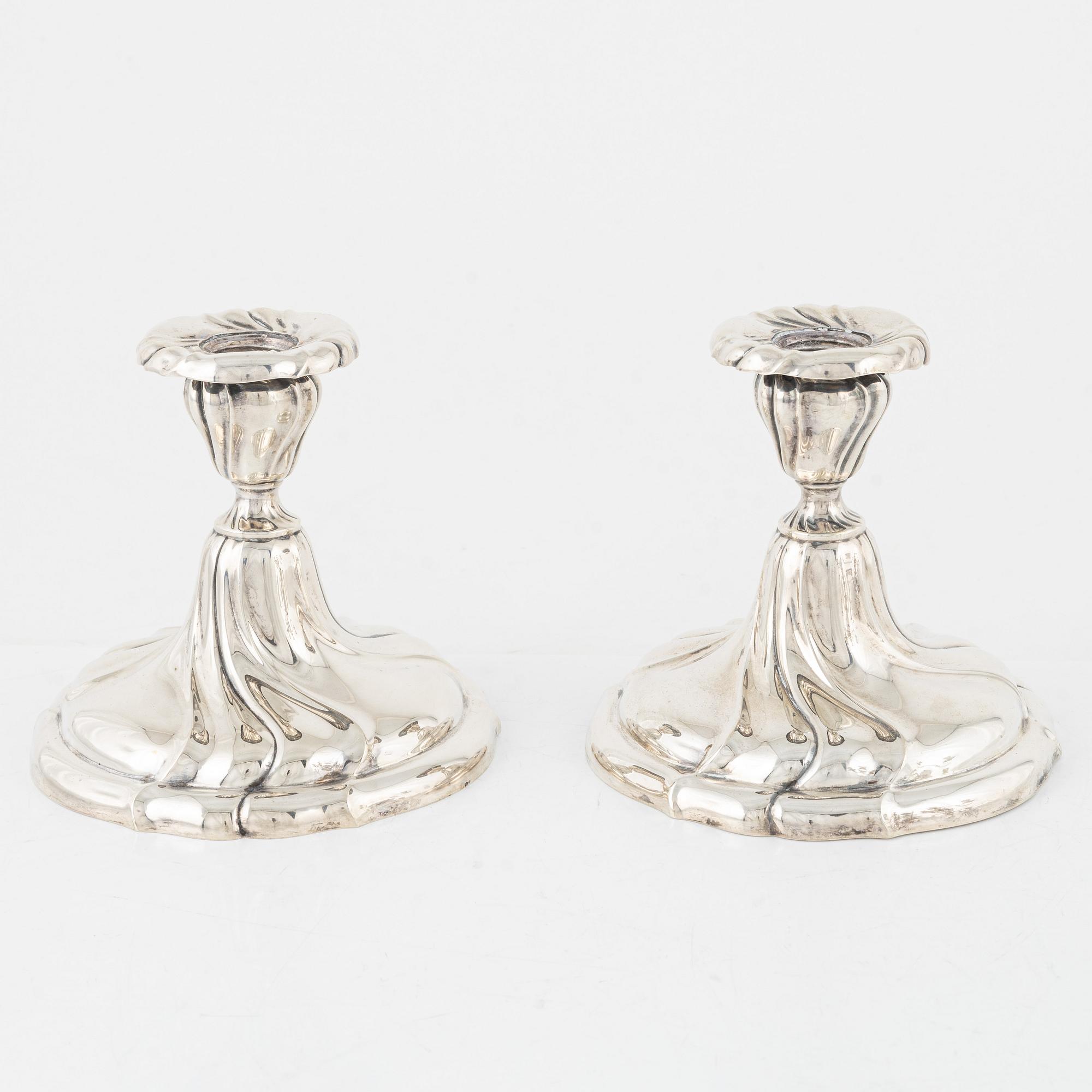 A pair of silver Rococo-style candelabra, Germany, first half of the 20th century.