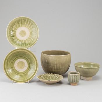 A group of olive green glazed bowls, South East Asia, 20th Century. (6 pieces).