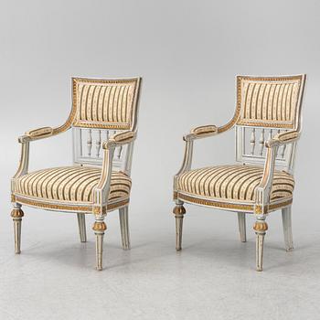 A pair of Gustavian style armchairs, 19th Century.