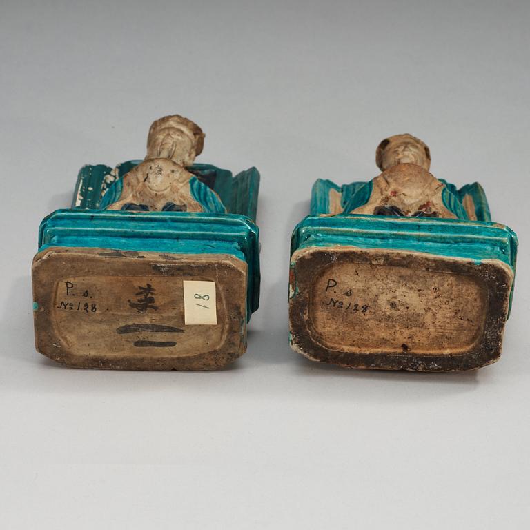 Two turquoise and purple glazed figures of daoistic dignitaries, Ming dynasty, 17th Century.