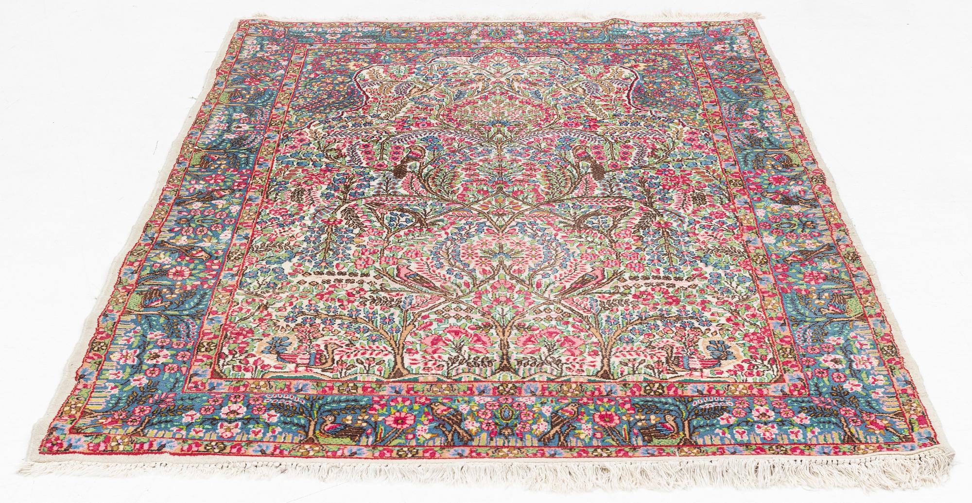 A semi-antique 'Millefleur' Kerman, ca ca 245 x 148 cm.