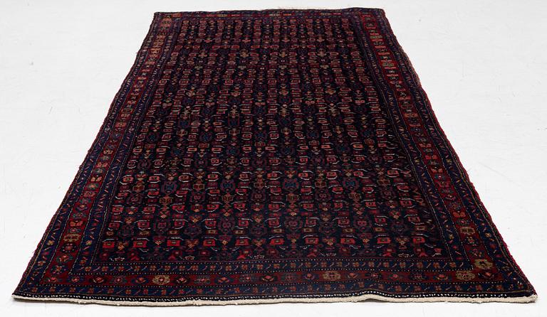 A semi-antique Bidjar carpet, c. 310 x 145 cm.