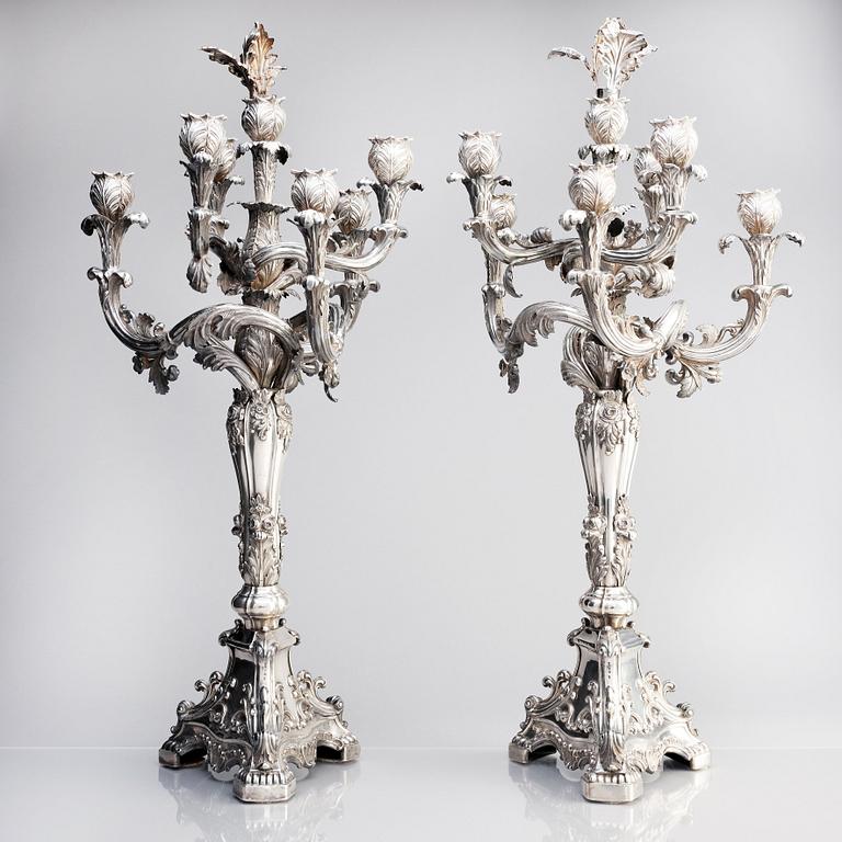 A pair of Swedish mid 19th century silver candelabra, marks of Gustaf Möllenborg, Stockholm 1844.