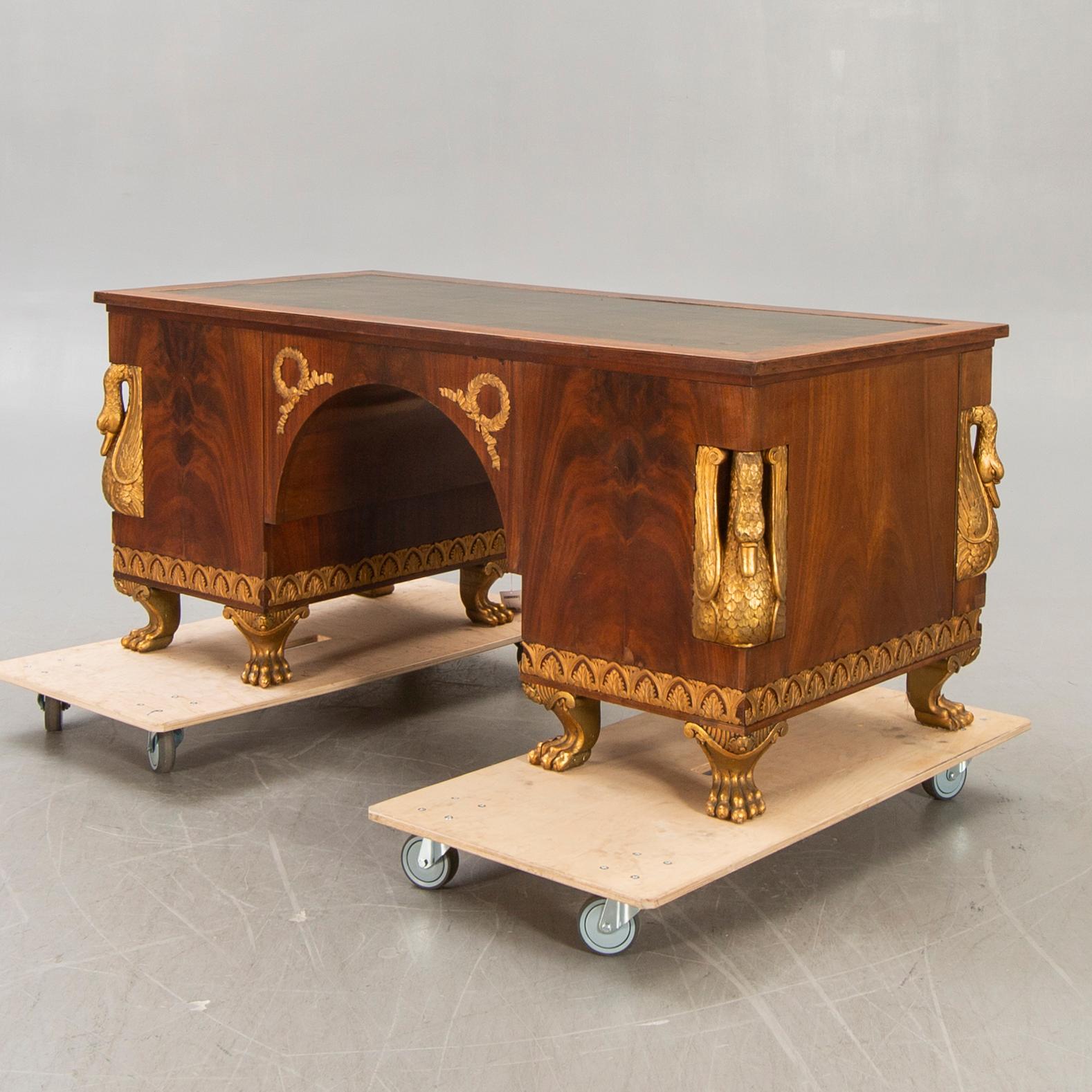 An Empire style mahogany desk 20th century.