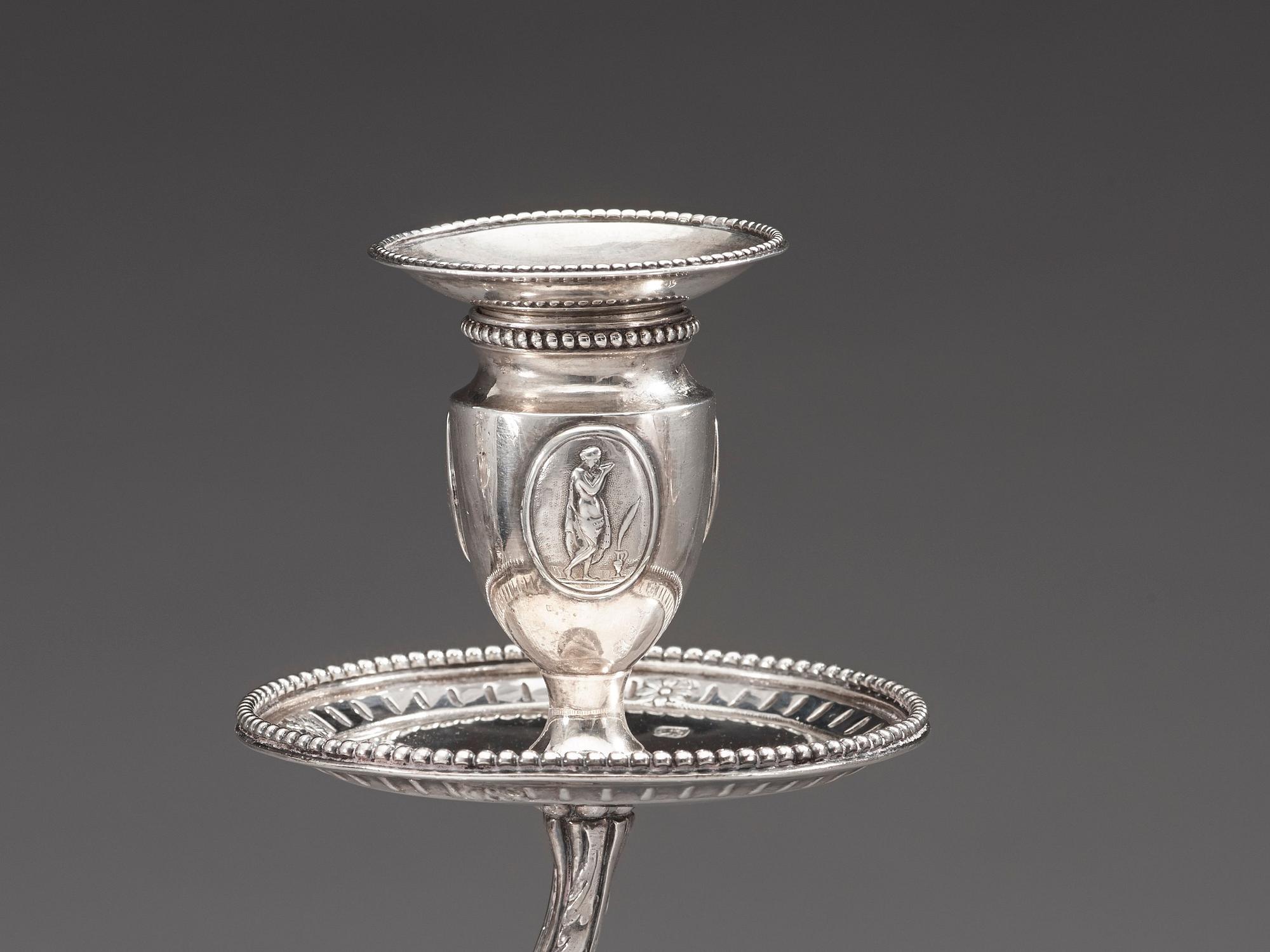 A pair of English 18th century silver candelabras, marks of Henry Hobdell, London 1778.