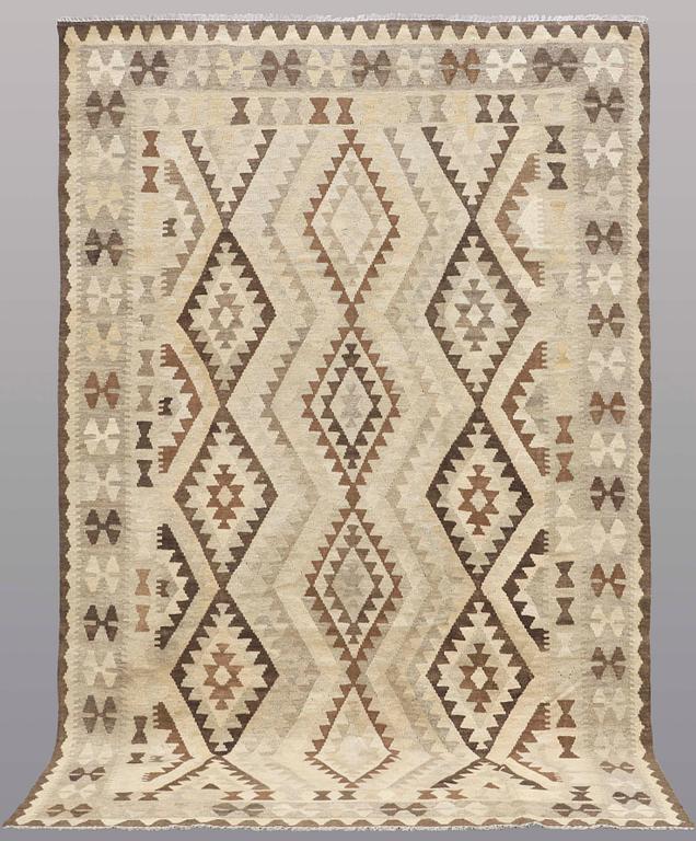 A carpet, Kilim, ca 306 x 193 cm.
